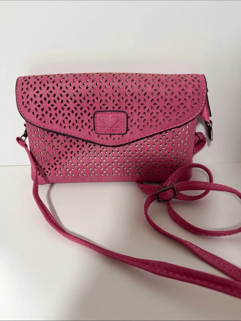 Pink Laser-Cut Crossbody Bag